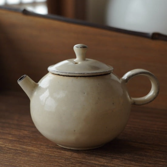 Round-shaped Ceramic White Powder Glaze Teapot