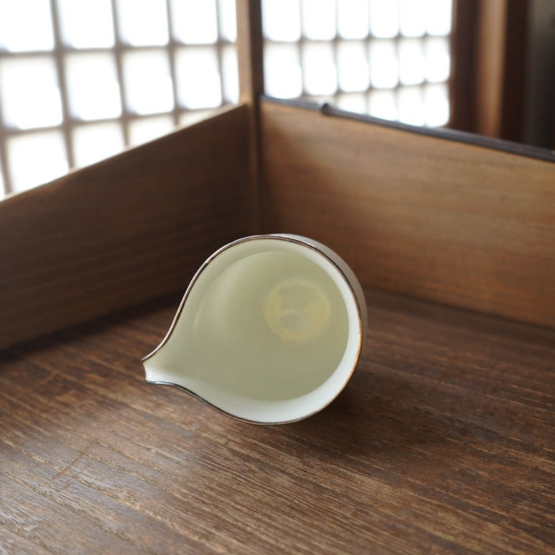 Silver-rimmed white porcelain shrink-mouth fair cup