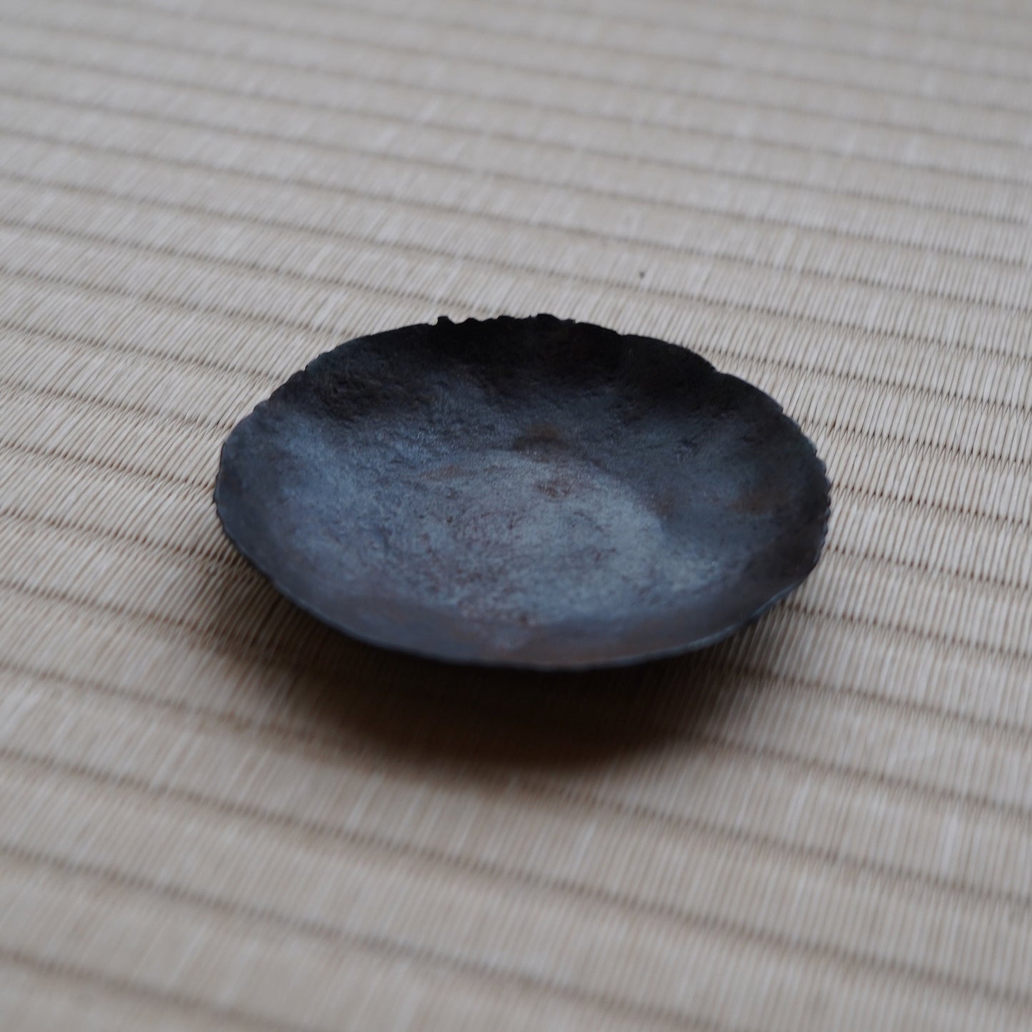 Hand-forged iron tea saucer