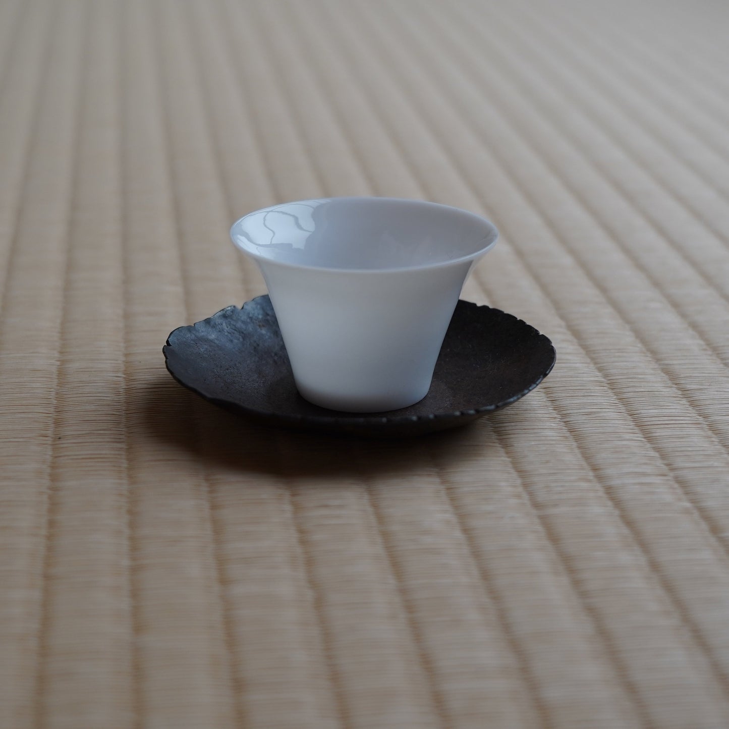 Hand-forged iron tea saucer