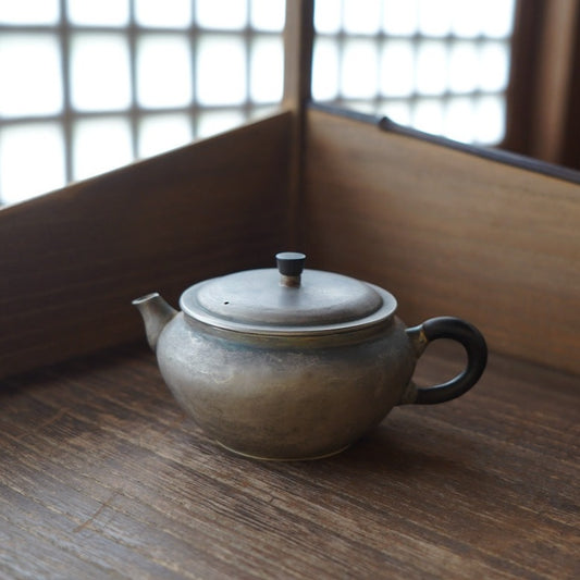 Ebony Cylindrical Knob, Ebony Ring Handle, Round-flat Body Silver Teapot